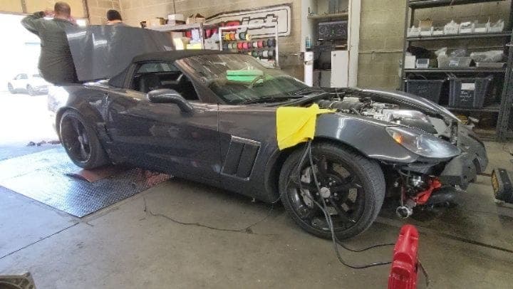 Supercharged C6 Corvette strapped down on the dyno for tuning at Turbo Lab in Orem
