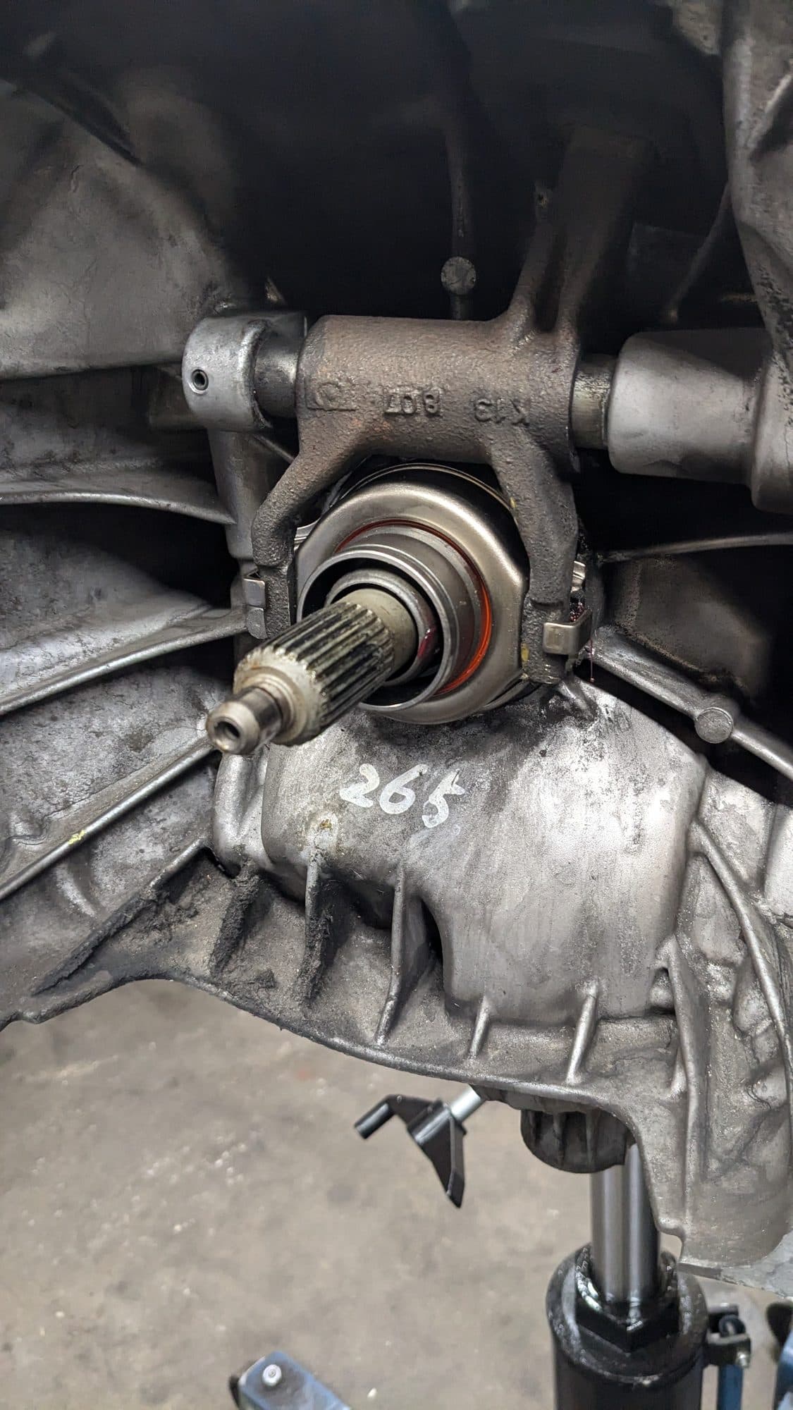 Transmission on a jack showing the bellhousing and input shaft at Turbo Lab in Orem, UT
